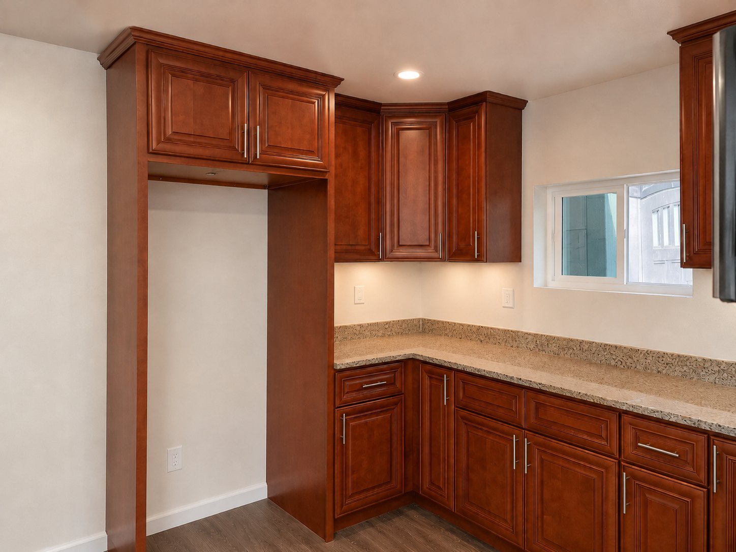 Classic Maple Walnut raised-panel cabinet corner installation