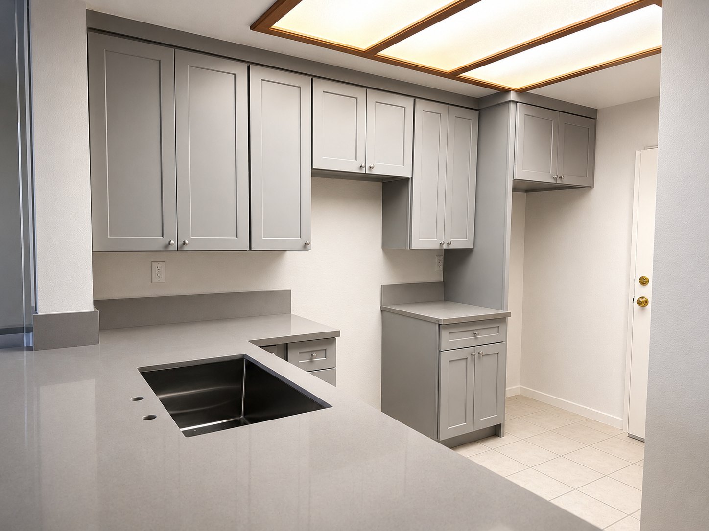 Gray Shaker cabinets with undermount sink