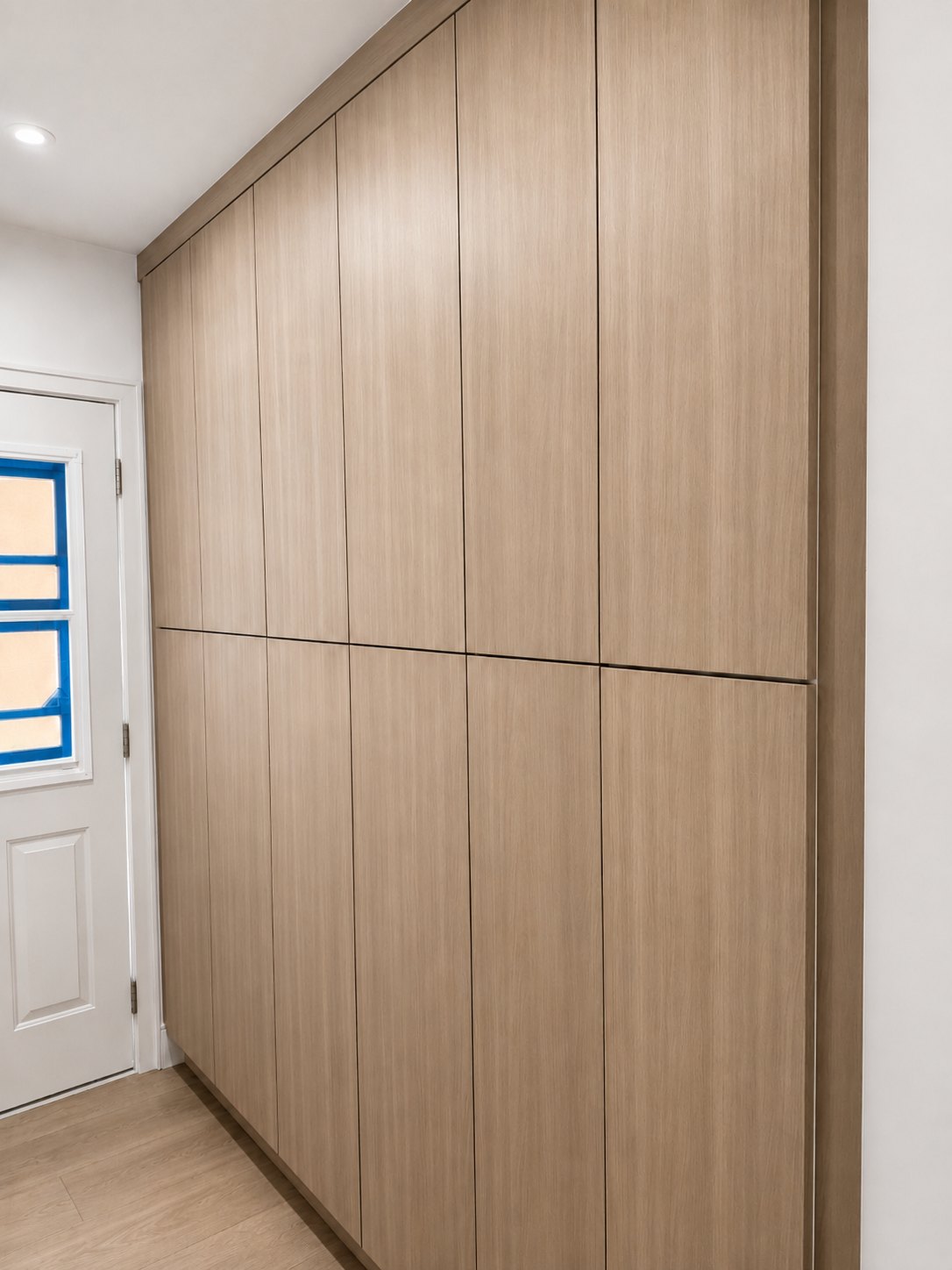 Natural oak full-height flat-panel cabinets